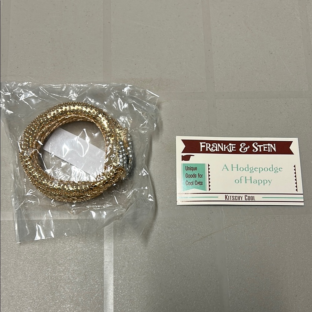 Gold tone and Silvery Serpent Bracelet with Sparkling Embellishments - Picture 8 of 12